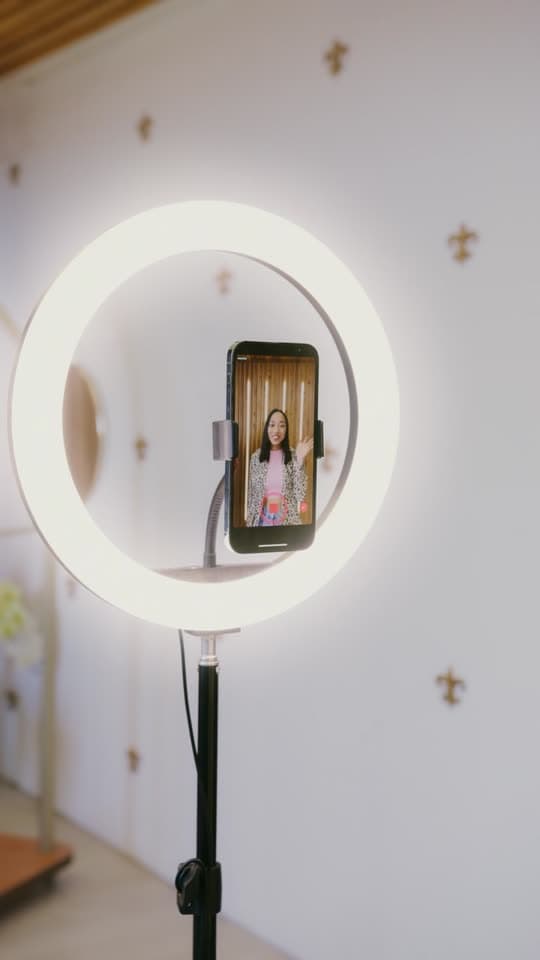 Example video: a phone on a ring light recording a creator talking to camera
